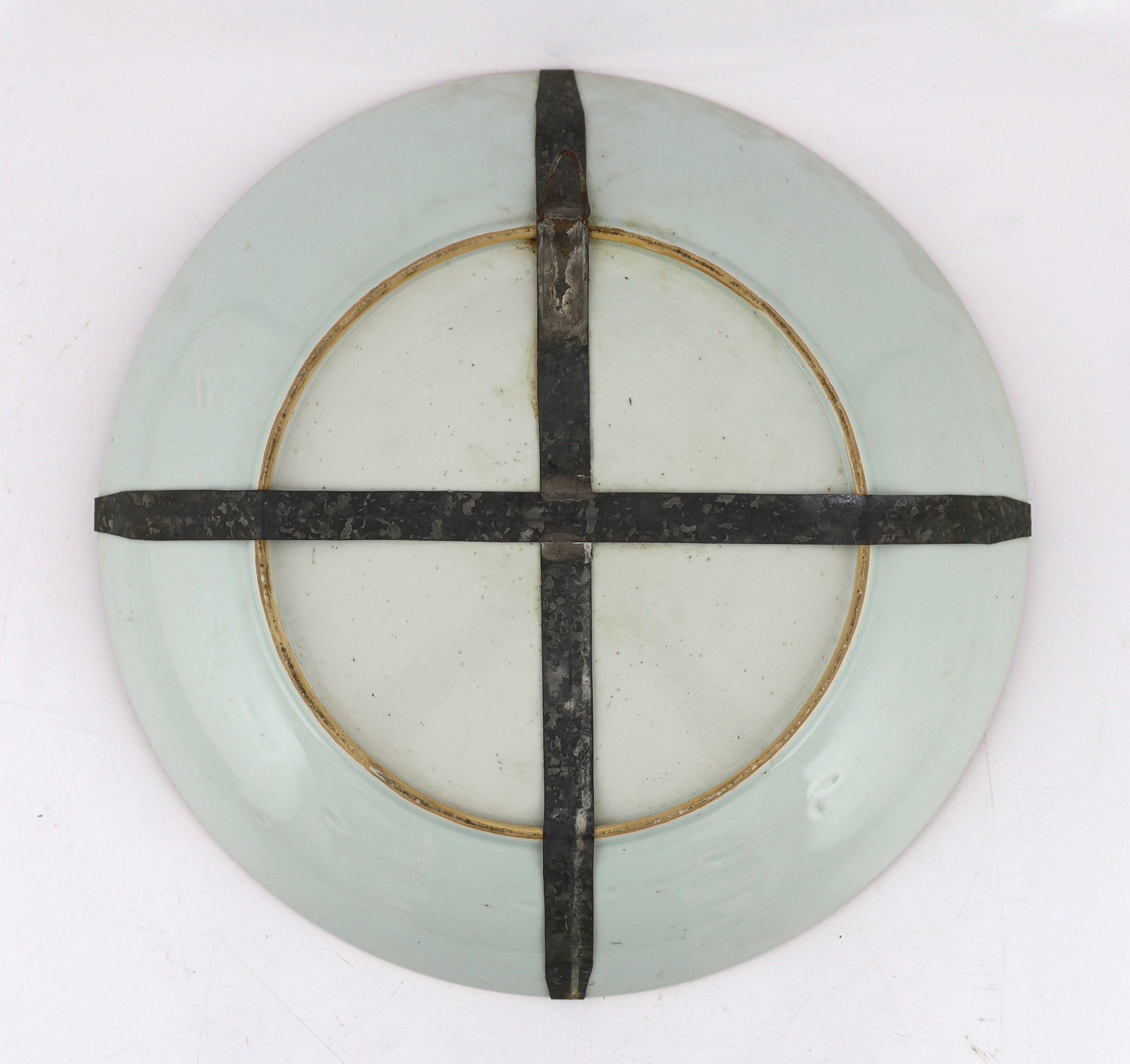 A Chinese blue and white landscape dish, Yongzheng/Qianlong period, short hairline crack